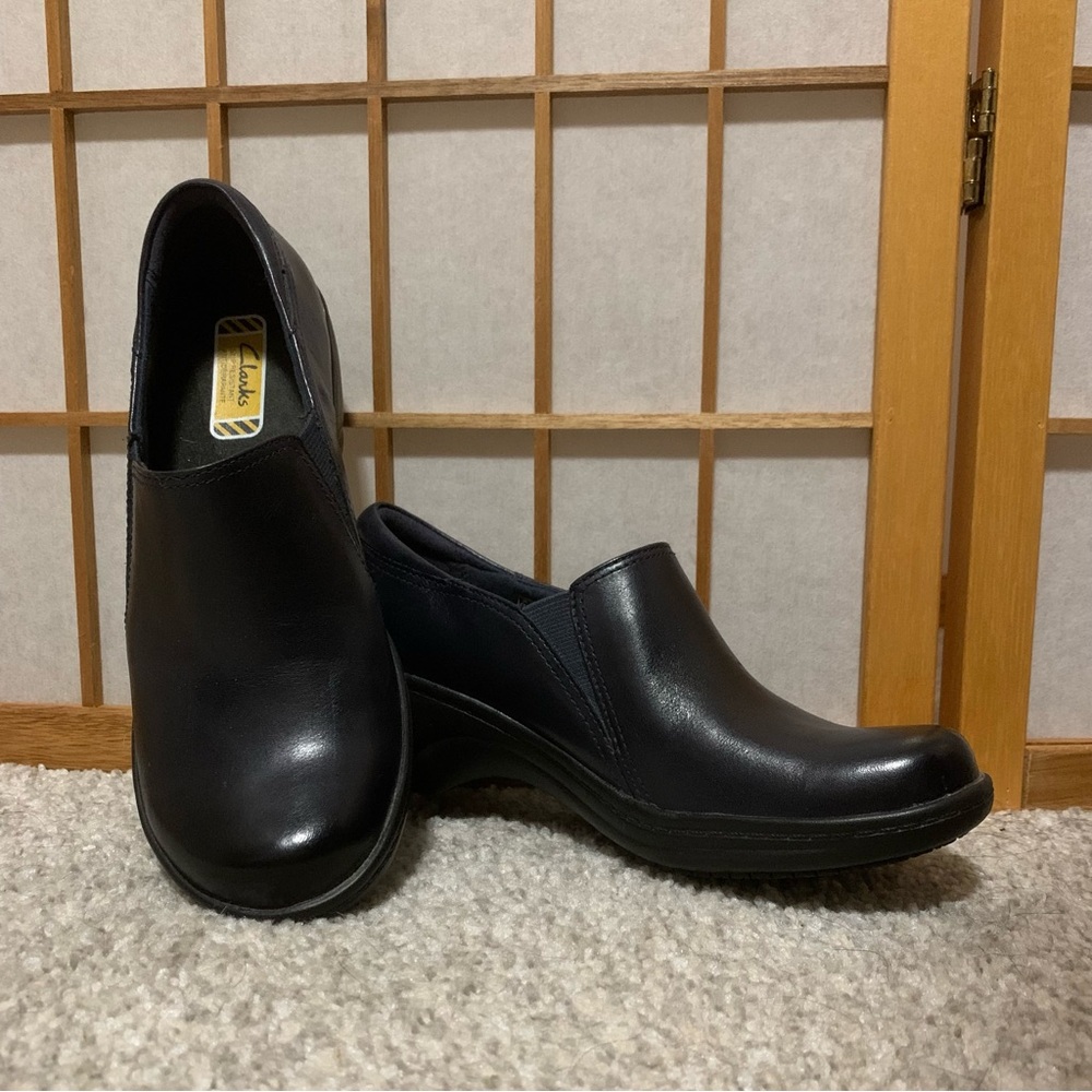 Clark’s navy slip resistant slip-ons, size 6.5.